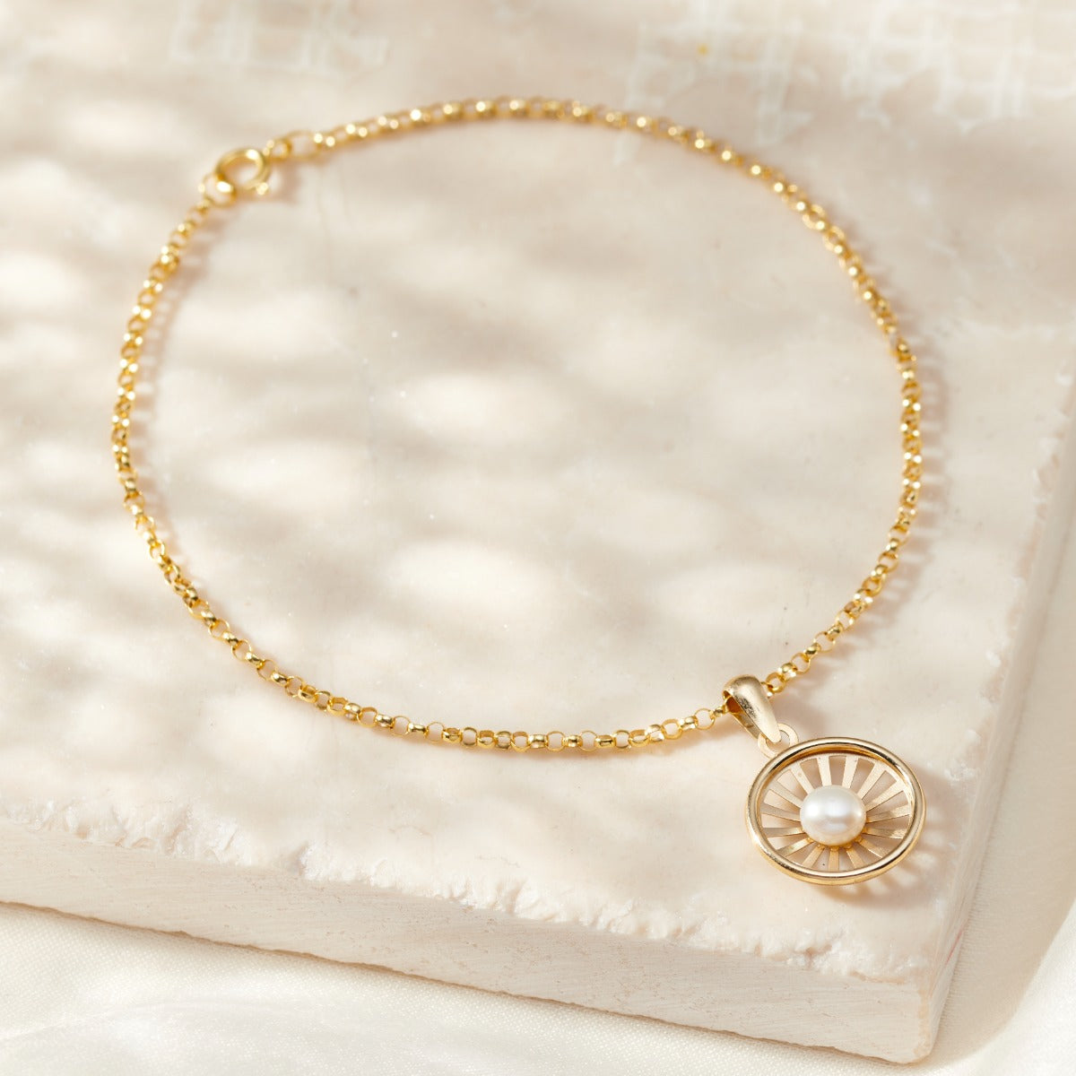 9ct Gold Pearl Sunburst Charm Bracelet