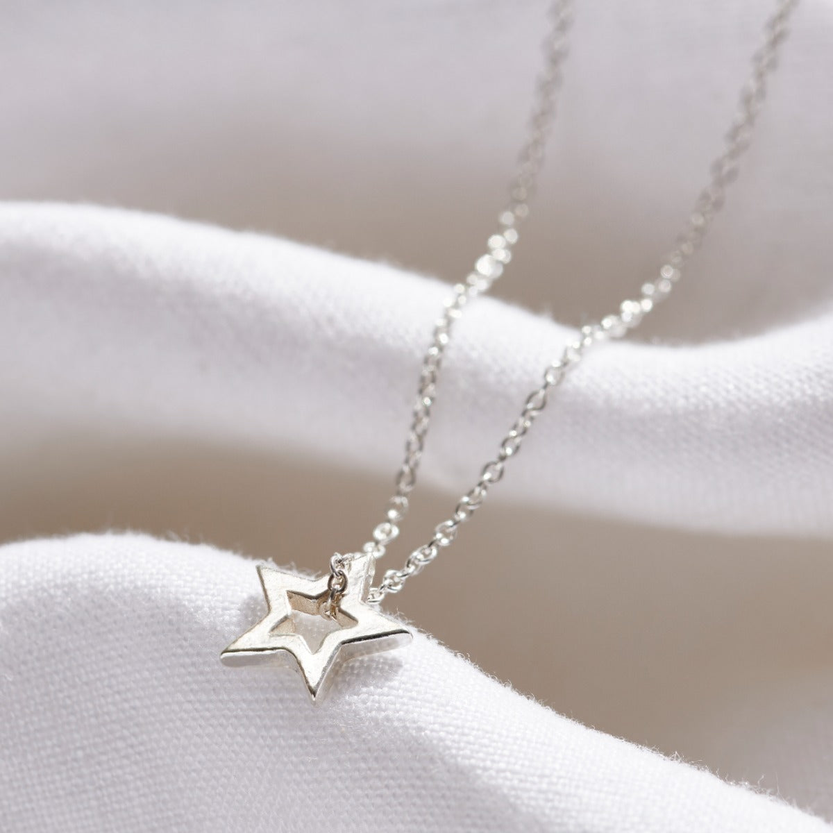 Small Open Star Charm Necklace